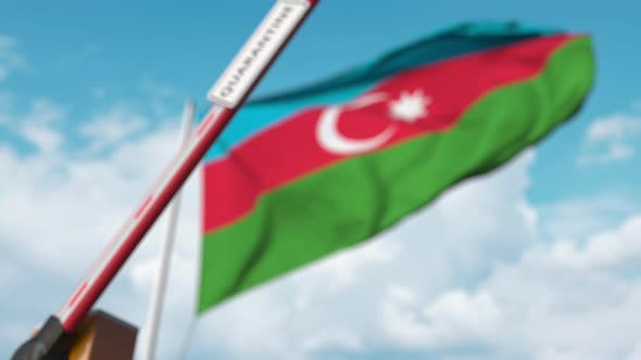 Closing Barrier with QUARANTINE Sign Against the Azerbaijani Flag alt