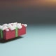 Gift in red box with green ribbon floating in the air. Snow. New year and Christmas present. - VideoHive Item for Sale