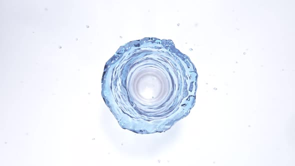 Super Slow Motion Shot of Water Vortex Splash Isolated on White Background at 1000Fps