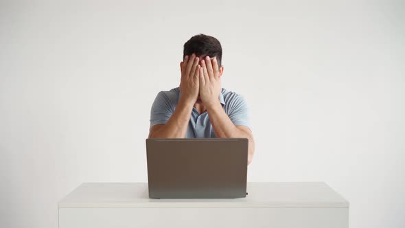 Happy Office Worker Works at Laptop and Funny Rejoices at Successful Deal