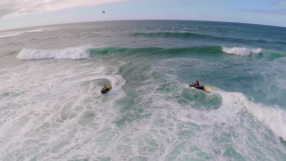 Aerial view of lifeguard surf rescue jet ski personal watercraft in Hawaii