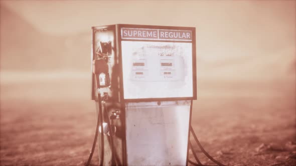 A Vintage Rusted Gas Pump Abandoned in the Desert alt