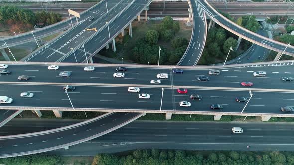 Aerial View of Road Junction with Moving Cars