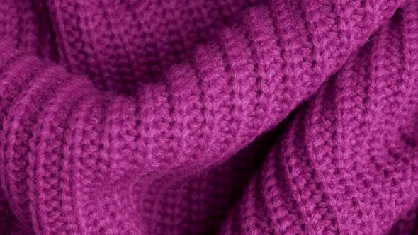 Pink Knitted Fabric As a Background. Macro