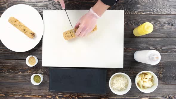 Hands Cutting Sushi Top View.