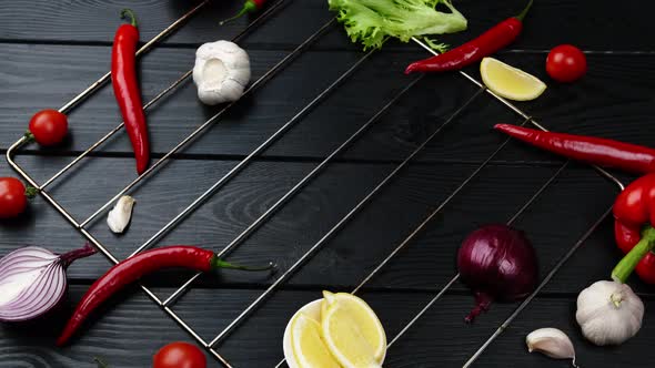 Food Background on Rustic Metal Backdrop with Red Pepper Herbs and Spices Top View