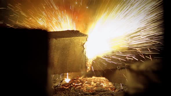 Cutting Torch or Blow Torch cutting a Steel Bar.