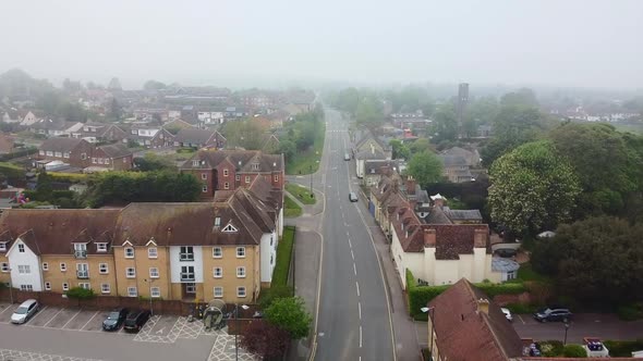 Aerial drone slowlying through empty English town in Covid lockdown