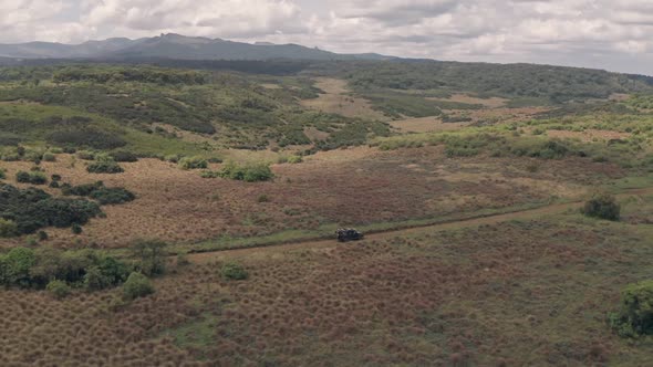 Driving in Aberdare National Park, Kenya, Africa, Aerial drone view