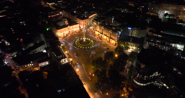 Flying over column of freedom in the center of the city. St. George monument of liberty in Tbilisi