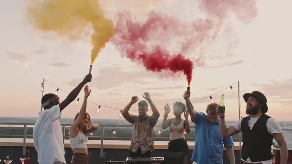 Happy People Partying on Rooftop Terrace in Summer