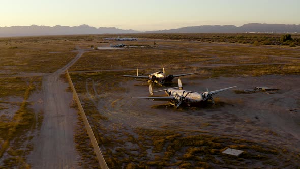 Abandoned Aircraft in Desert Field Boneyard Aerial