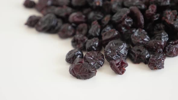 Sweetened and  dehydrated cranberries 4K 2160p 30fps UltraHD  tilting  footage - Pile of Vaccinium o