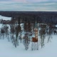 Aerial Top View of the Krimulda Evangelic Lutheran Church in Winter at Sunrise Latvia 4k Video - VideoHive Item for Sale