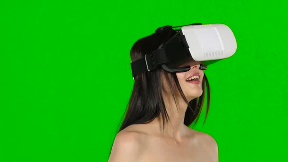 Woman Using Virtual Reality Headset, VR Mask, Close Up. Green Screen