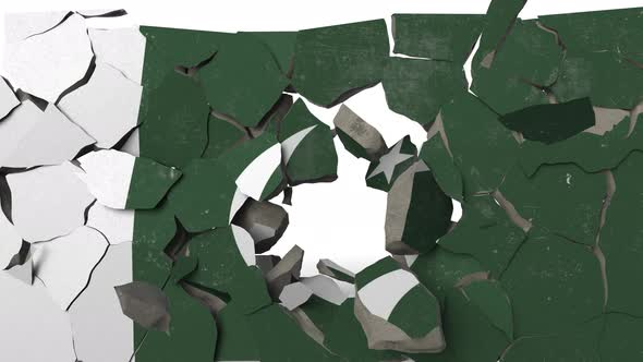Breaking Wall with Painted Flag of Pakistan alt