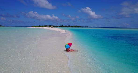 Happy couple after marriage in love live the dream on beach on paradise white sand background 4K