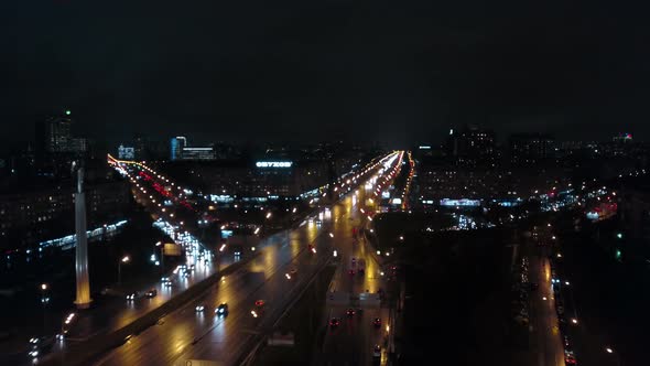 Aerial view of traffic on night roads in Moscow, Russia