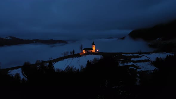 Church of St. Primoz and Felicijan in the Morning. Jamnik, Slovenia. Aerial View