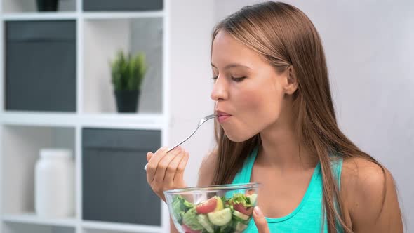 Hungry Fitness Girl Eating Fresh Vegetable Salad Having Positive Emotion Medium Closeup