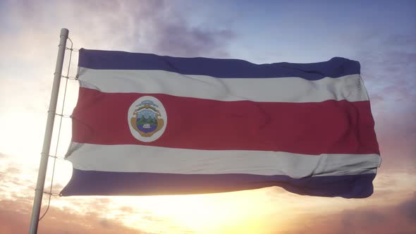 Flag of Costa Rica Islands Waving in the Wind Sky and Sun Background