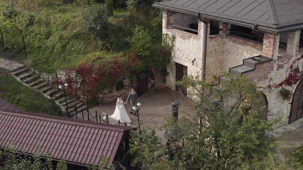 Lovely Newlyweds Caucasian Bride Groom Walking in Park Holding Hands Wedding Couple Family