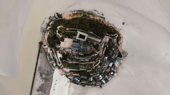 Drone Rotating Left Above Famous Mont Saint Michel Island Town Fortress, Iconic Sightseeing Landmark