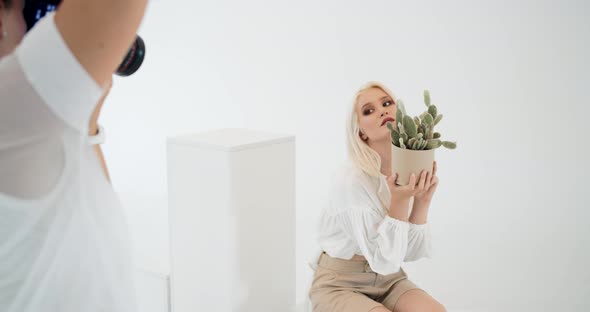 Woman Posing for Photoshoot in Studio