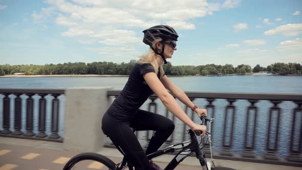 Cyclist Happy Cycling Travel Woman On Helmet On Bicycle.Girl Helmet Cycling On Bike Sport Recreation