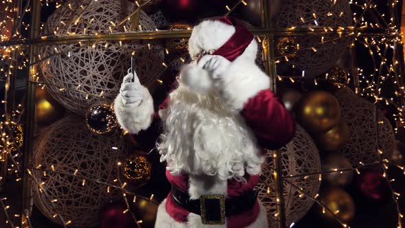 Santa Claus Saint Nicholas Takes a Selfie and Sends a Message on Christmas Eve