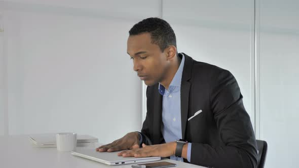 Casual Afro-American Businessman Leaving Office After Work