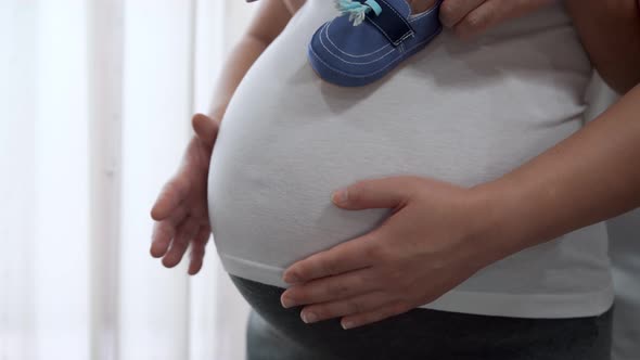 Pregnant Couple Feels Love and Relax at Home