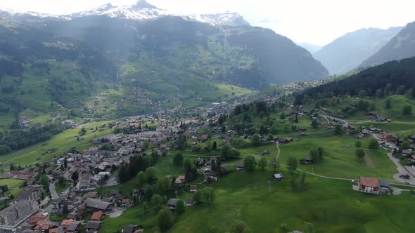 Flight over Grindelwald village in Switzerland, Europe