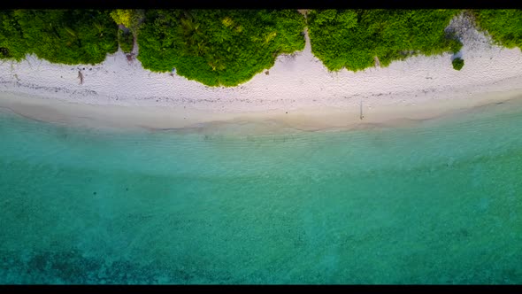 Aerial above panorama of perfect shore beach adventure by blue lagoon and clean sandy background of 