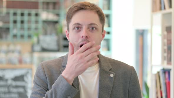 Portrait of Young Man Feeling Shocked