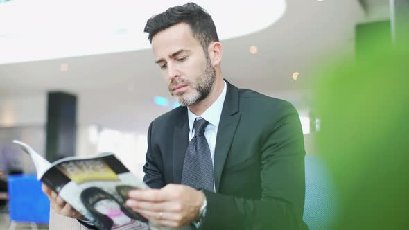 Man perusing magazine