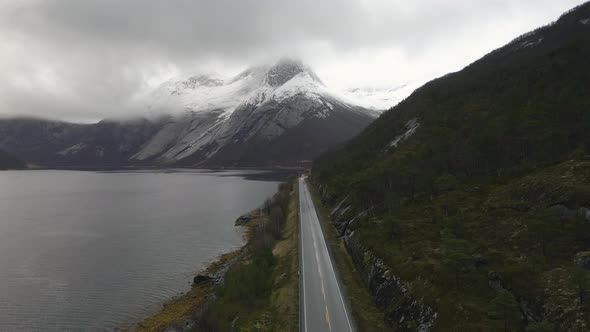 Scenic road next to Tysfjord with epic drone view of Stetind mountain, Norway