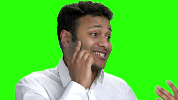 Close Up Excited Man Talking on Transparent Phone