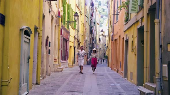 Menton France Colorful City View on Old Part of Menton ProvenceAlpesCote d'Azur France Couple on