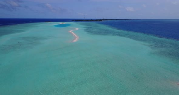 Luxury fly over abstract view of a sunshine white sandy paradise beach and turquoise sea background 