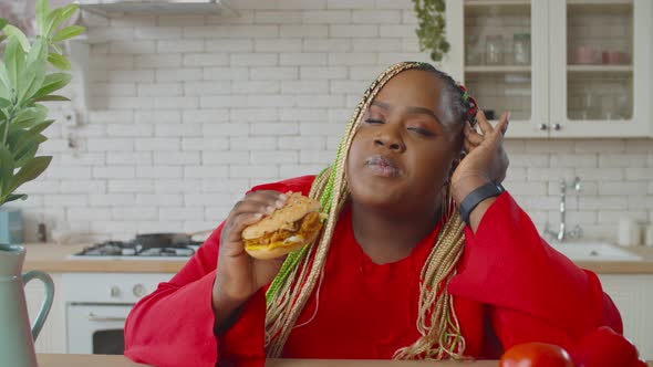 Hungry Fat Black Woman Enjoying Eating Fast Food