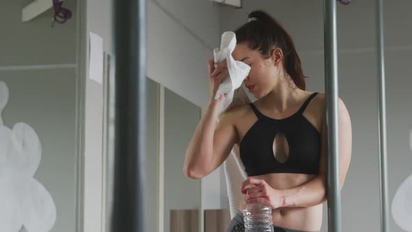 Caucasian woman drinking water