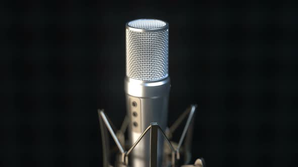 Camera Approaches Professional Microphone in Sound Recording Studio alt