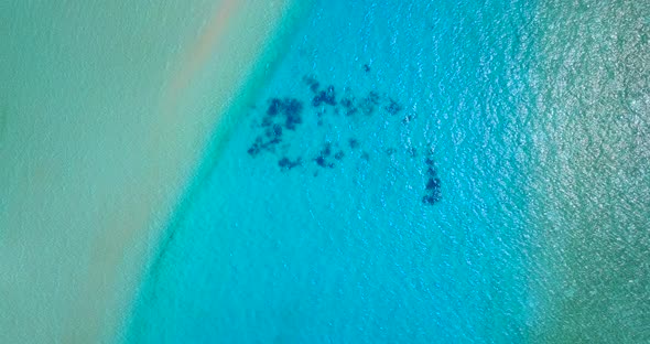 Wide angle flying abstract view of a summer white paradise sand beach and aqua turquoise water 