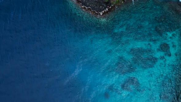 Top down view on peninsula and beatiful blue water