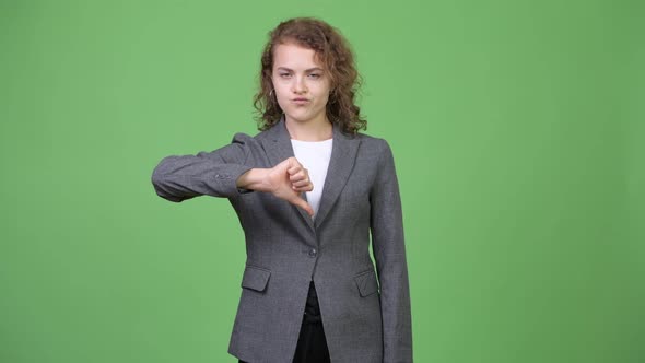 Young Stressed Businesswoman Giving Thumbs Down