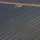 Aerial Drone Shot of Rows of Solar Panels Bisected with a Line - VideoHive Item for Sale