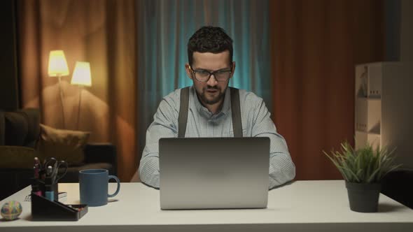 Excited Business Man Checking Email Reading Great News on Laptop