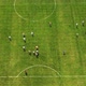 Aerial View From Top To Bottom On A Green Soccer Field. Dynamic Training With The Ball. - VideoHive Item for Sale