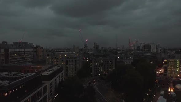 Aerial View of London Financial District Cityscape at Night